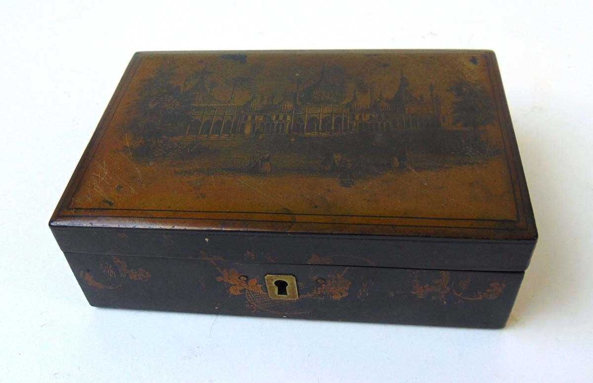 An early 19th century lacquered trinket box, with gilt transfer printed decoration of figures