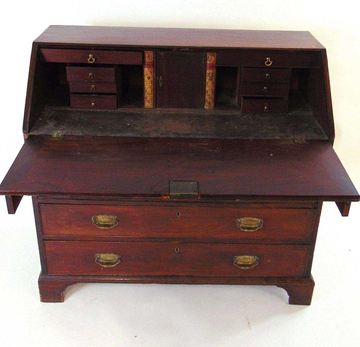 A George III mahogany bureau, the interior fitted with pigeon holes and drawers, above four oak - Image 4 of 4