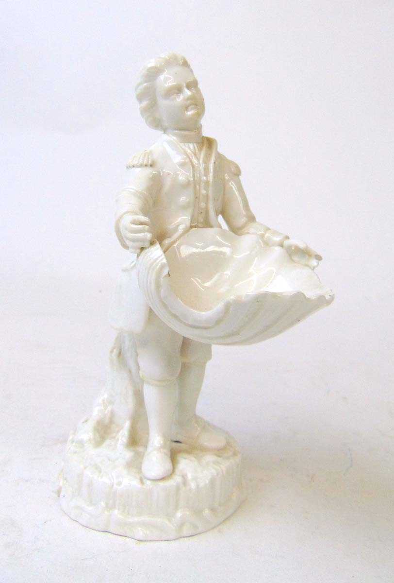 A 19th century Derby (Stevenson & Hancock) porcelain figural salt, modelled as a gent holding a - Image 2 of 3