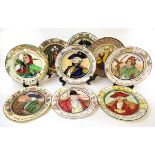 A collection of nine Royal Doulton character plates, comprising The Squire, The Parson, The Mayor,