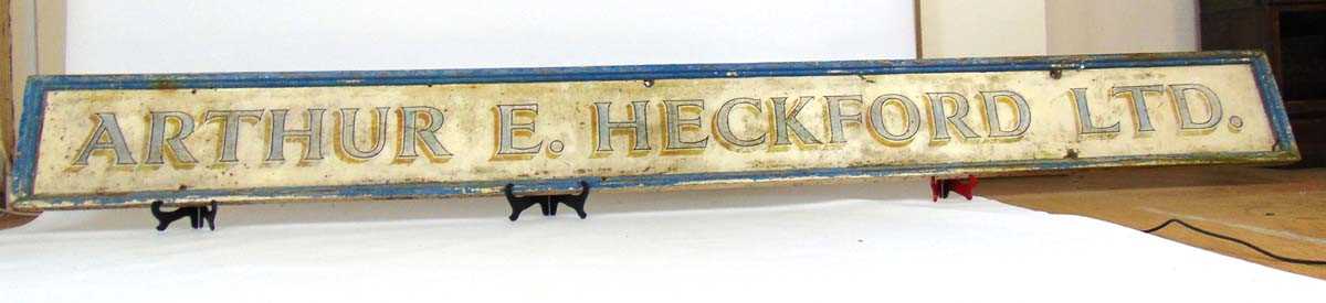 A large painted wood shop sign advertising 'Arthur E Heckford Ltd', 350cm x 35.5cm Graces Guide - Image 2 of 4