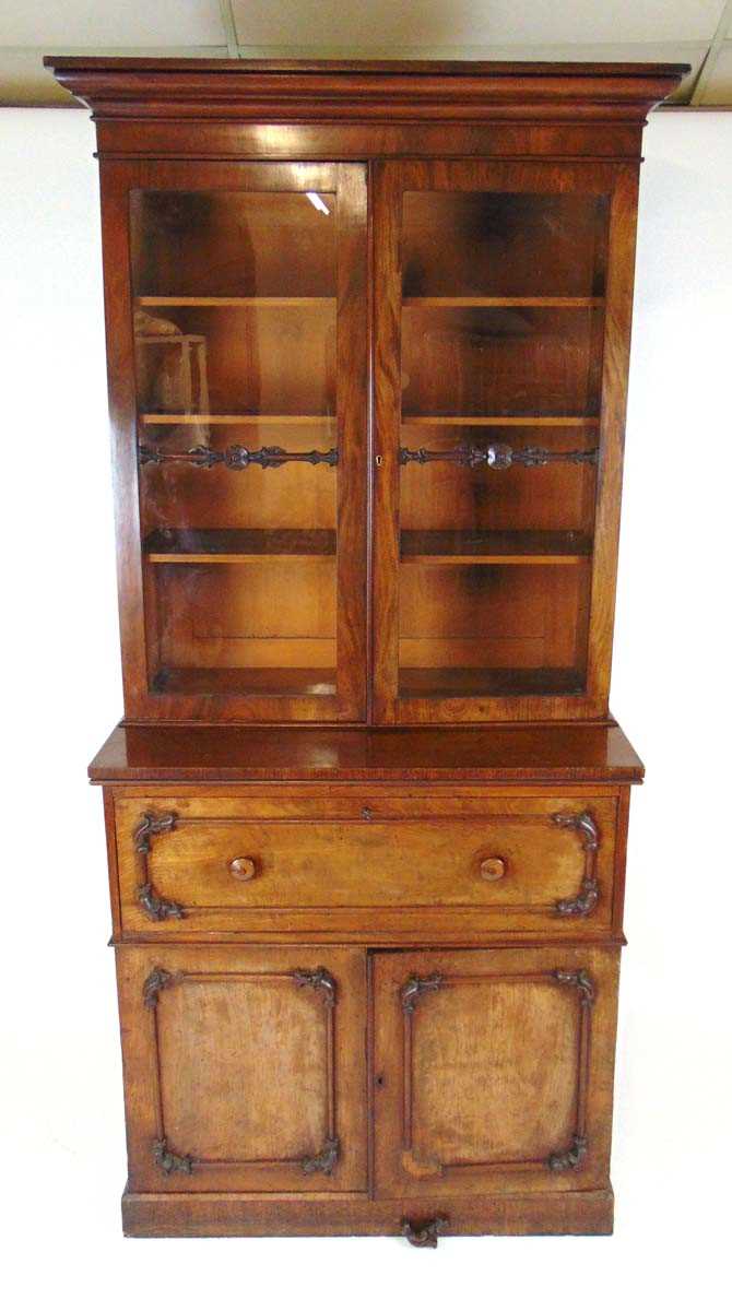 An early 19th century mahogany bookcase on cupboard base, with moulded pediment above glazed doors - Image 2 of 2