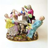 A Meissen porcelain satirical group, 19th century, after the original by J J Kandler, modelled as