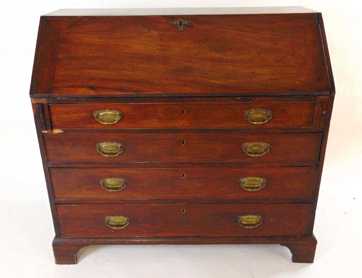 A George III mahogany bureau, the interior fitted with pigeon holes and drawers, above four oak - Image 2 of 4