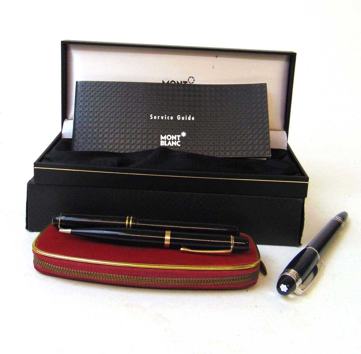 A Mont Blanc Starwalker rollerball pen, with black resin body, with presentation box and service