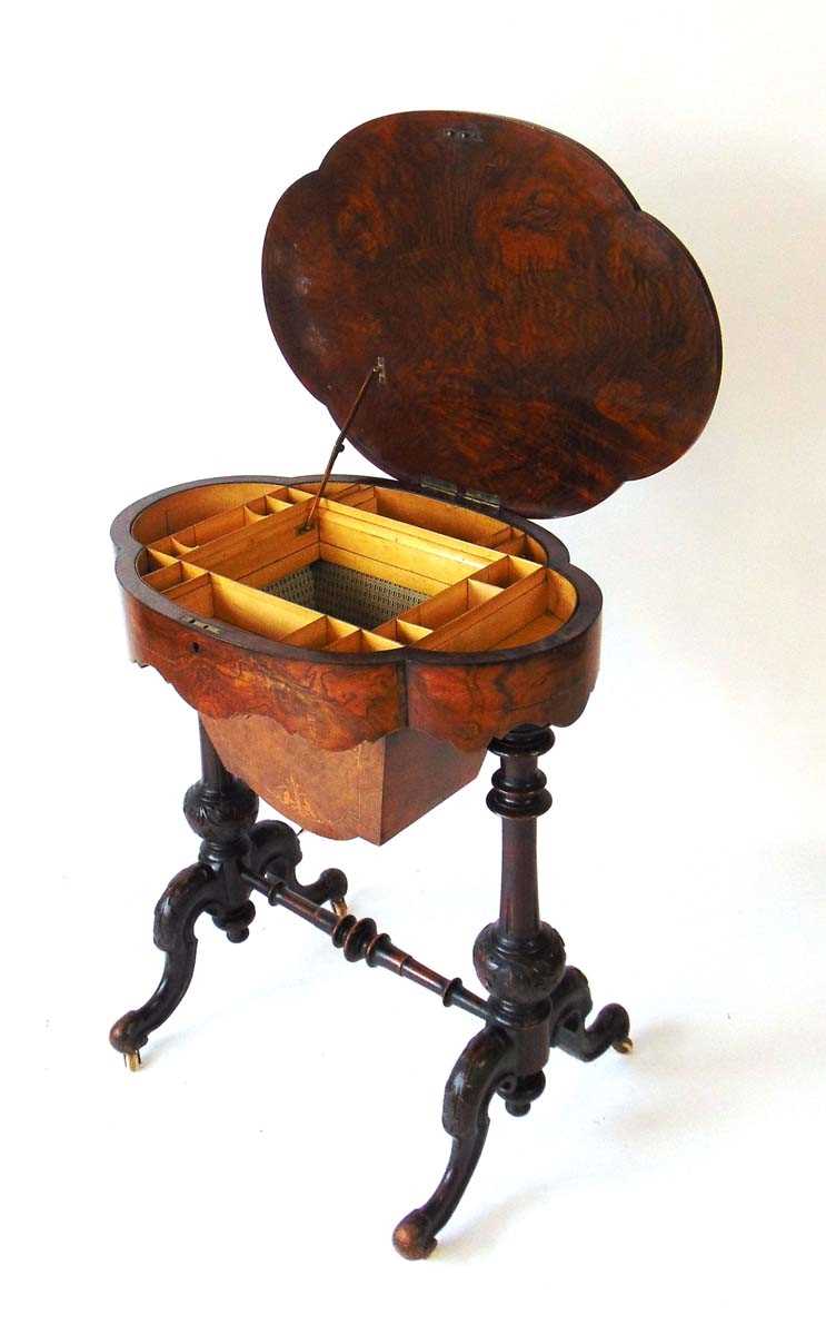 A Victorian walnut work table, the well figured book matched veneered top opening to reveal a fitted - Image 4 of 4