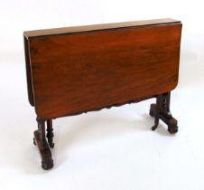 A Victorian rosewood Sutherland table, with elliptical drop leaves, on pierced foliate fretwork