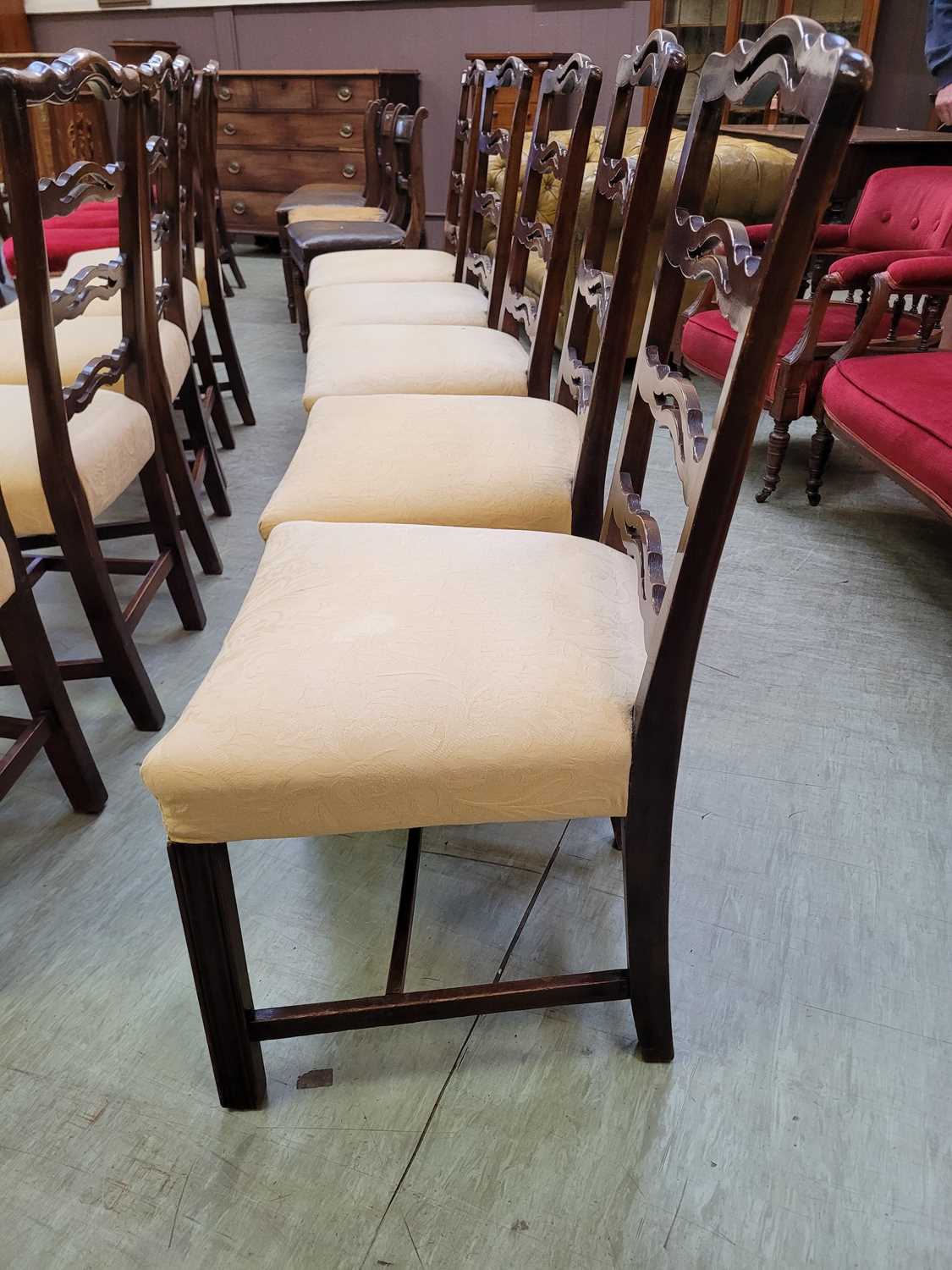 A set of ten George III style mahogany ribbon back dining chairs, with stuff over seats on channeled - Image 4 of 5