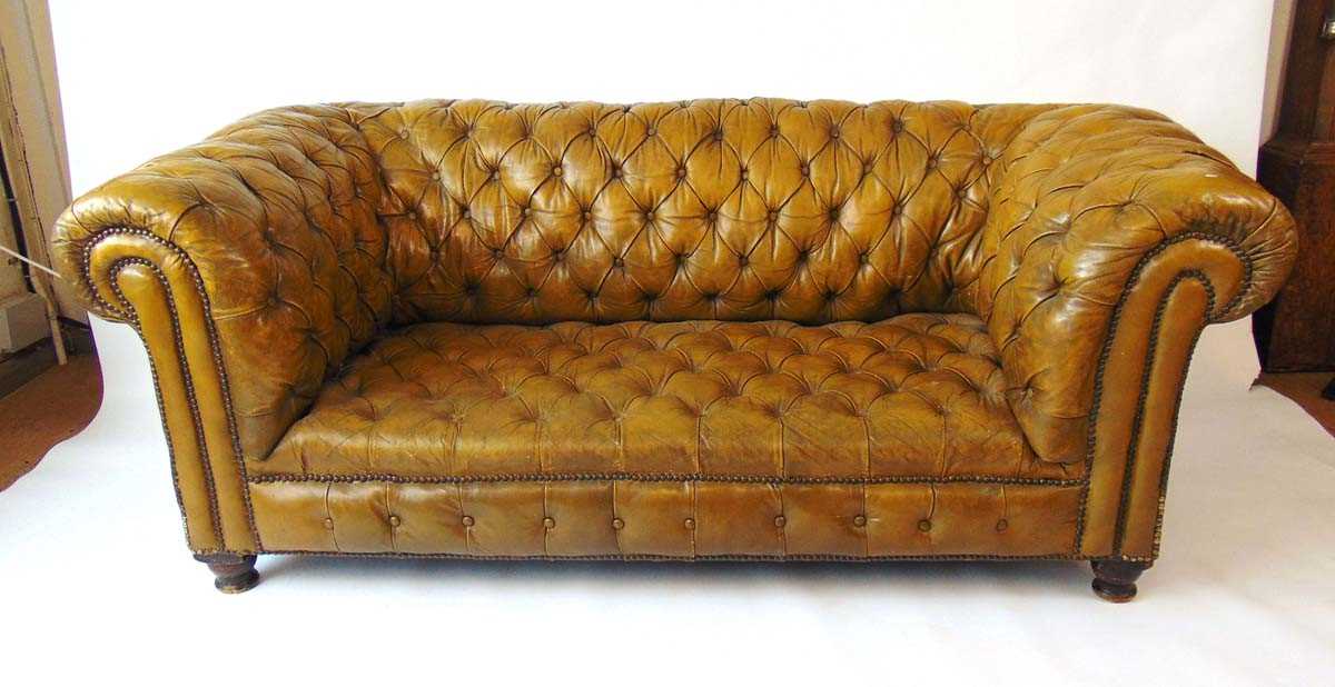 A Victorian green leather upholstered Chesterfield settee, with horsehair and sprung interior, on - Image 2 of 11