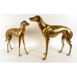 Two hollow cast figures of standing greyhounds, 66cm & 74cm high