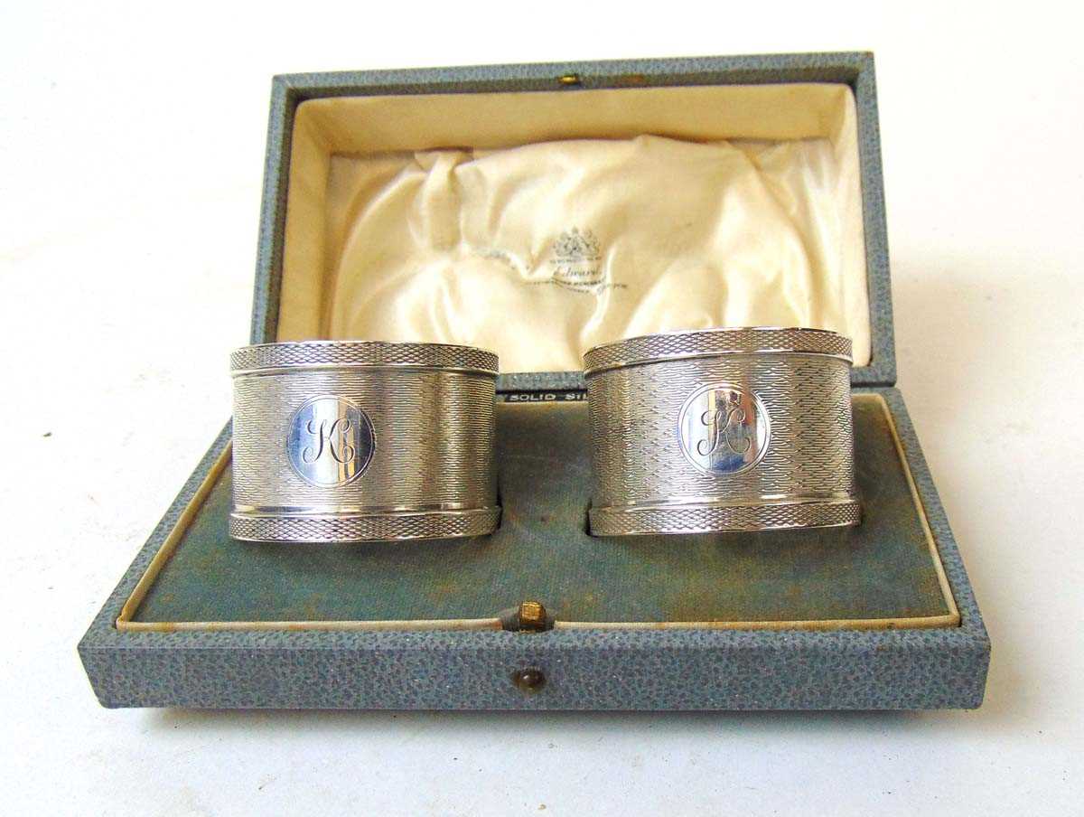 A pair of silver napkin rings, Colen Hewer Cheshire, Chester 1922, with cartouche initialed 'K', - Image 2 of 3