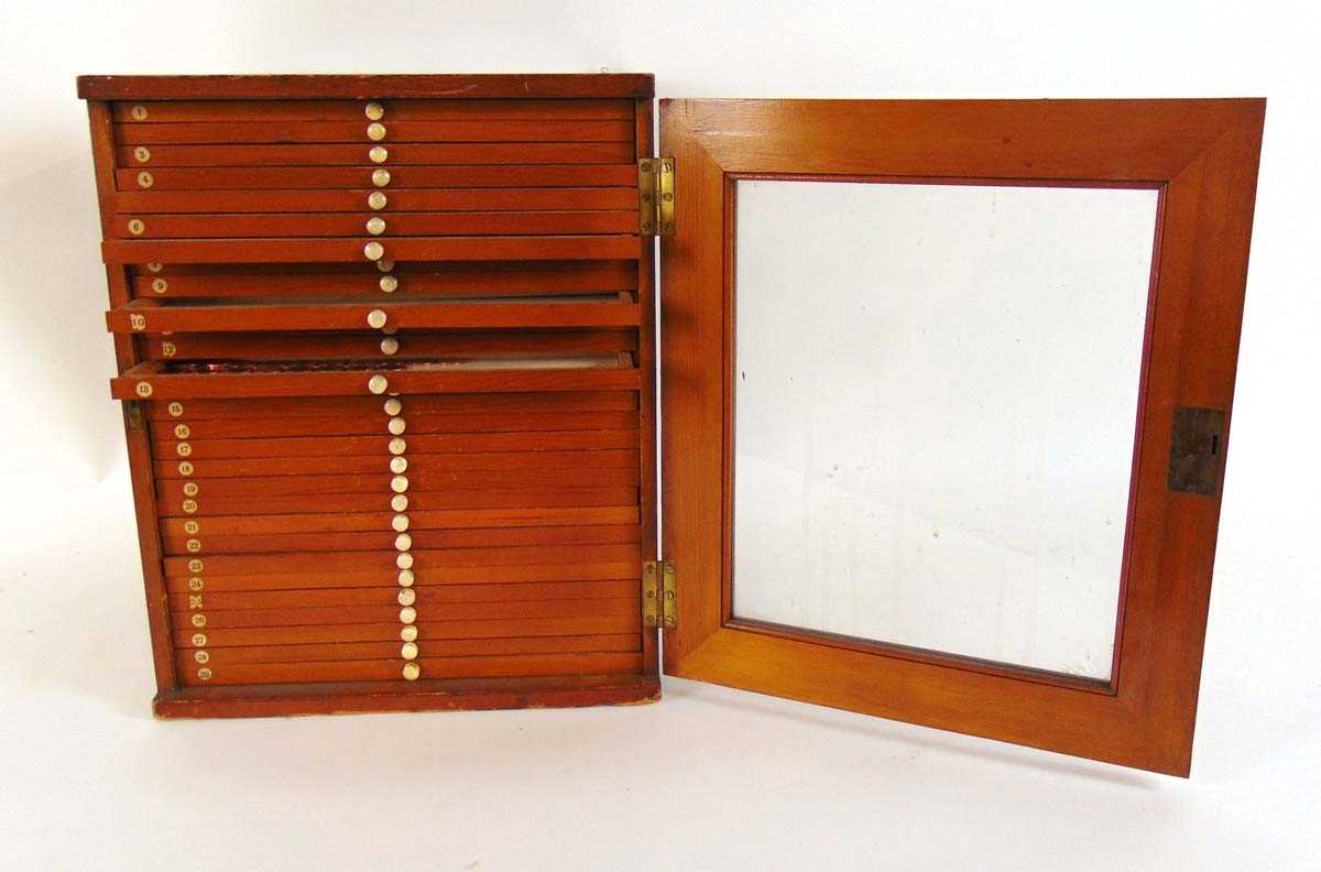 A Victorian collectors cabinet, the stained pine case with glazed door enclosing twenty nine shallow - Image 4 of 10