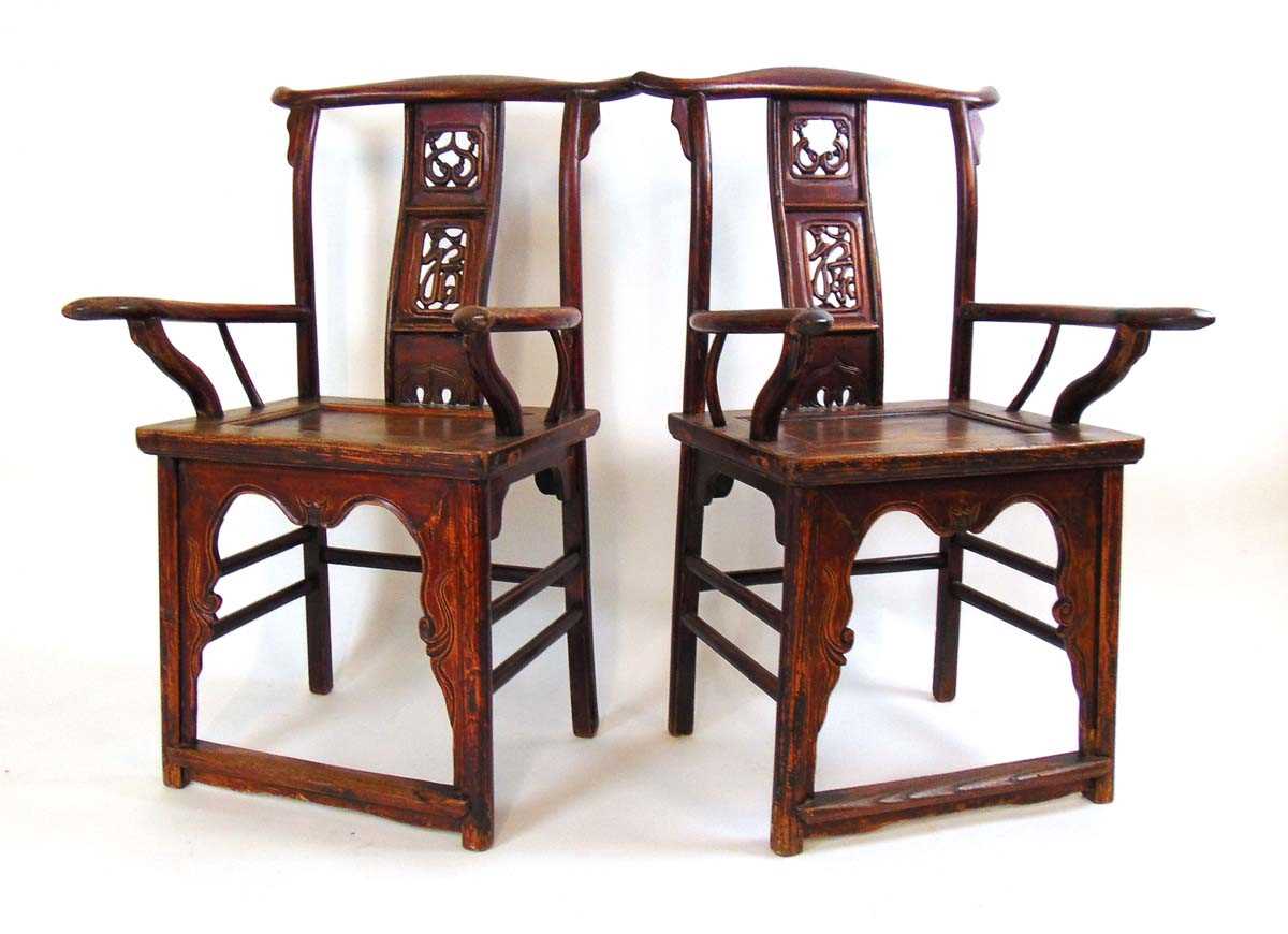 A pair of Chinese elm official hat armchairs, Qing dynasty, the shaped top rail above a pierced ruyi - Image 2 of 4