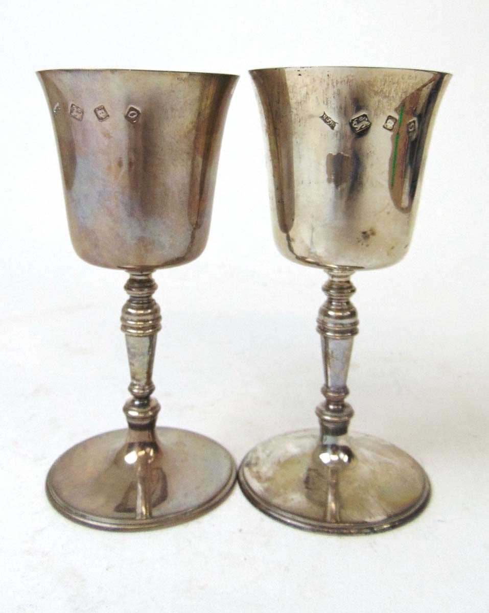 A pair of silver goblets, S J Rose & Son, London 1969, with silver gilt interior bowls, 16.5cm,