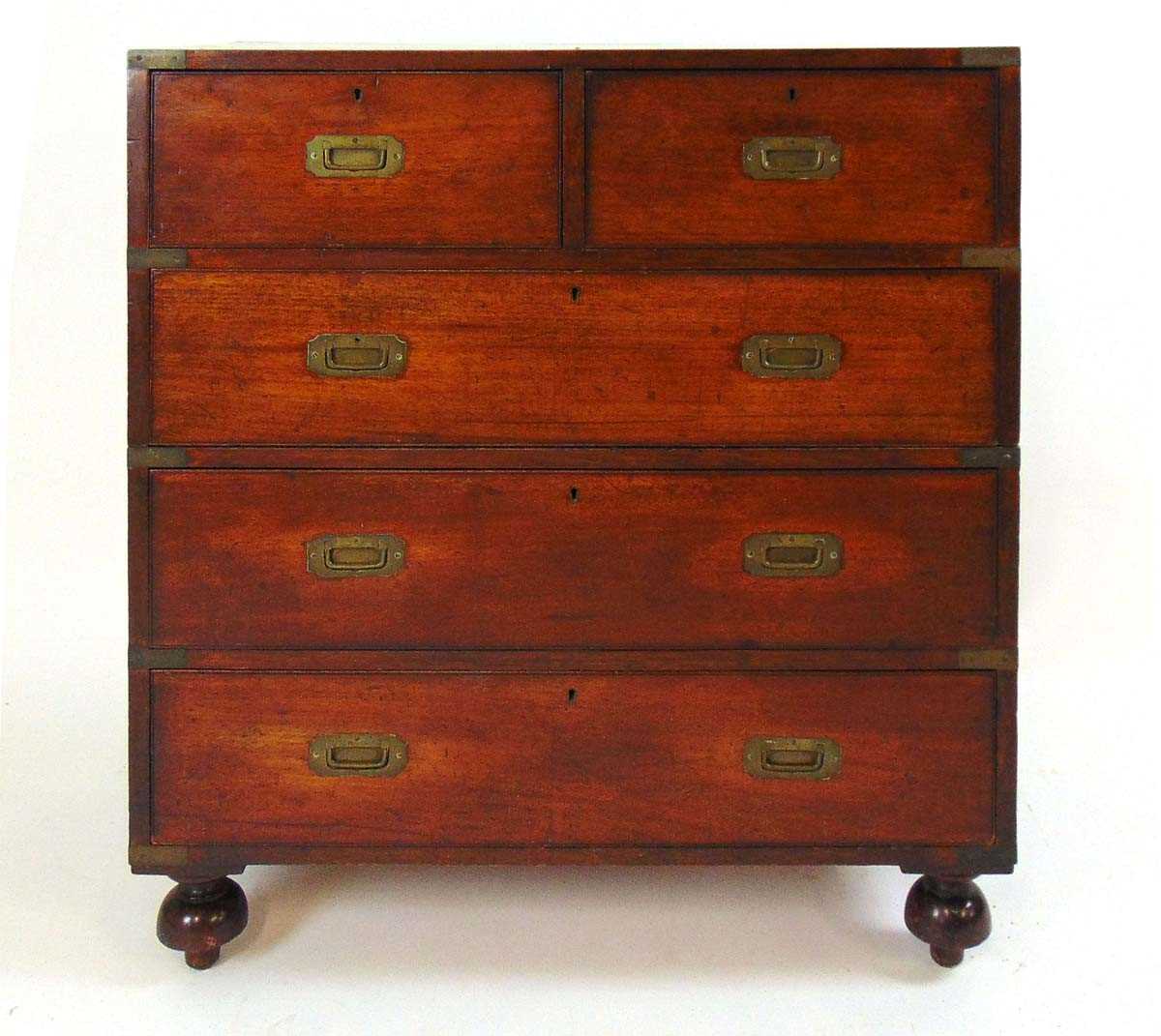A 19th century mahogany and brass bound two part campaign chest, with two short over three long