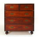 A 19th century mahogany and brass bound two part campaign chest, with two short over three long