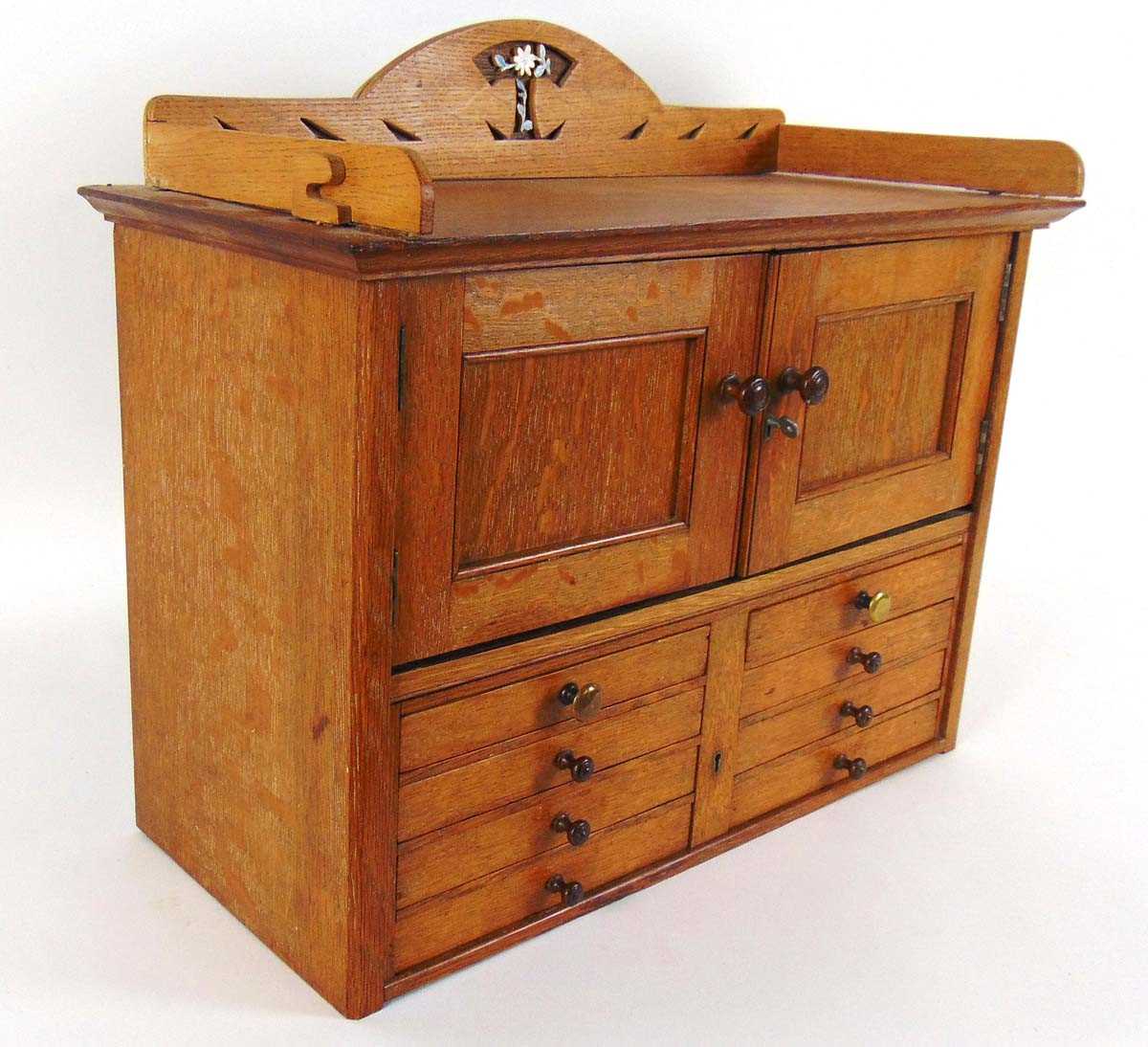 An early 20th century table top oak cabinet, with blind gallery above two cupboard doors and eight - Image 3 of 3