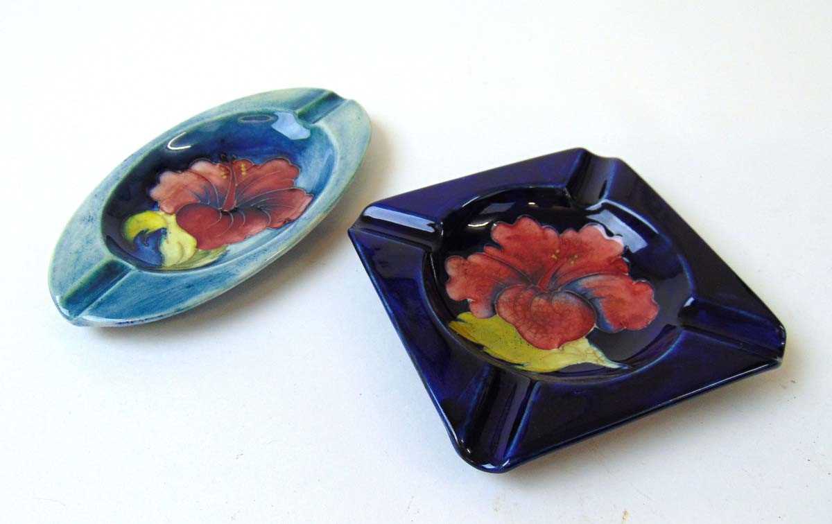Two William Moorcroft Hibiscus pattern ashtrays, early to mid 20th century, each with applied - Image 2 of 2