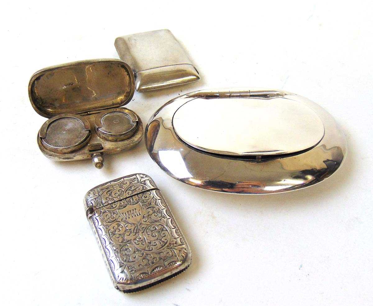 A silver snuff box, makers initials CB & FD, Birmingham 1905, of shallow oval form, 9.5cm, two