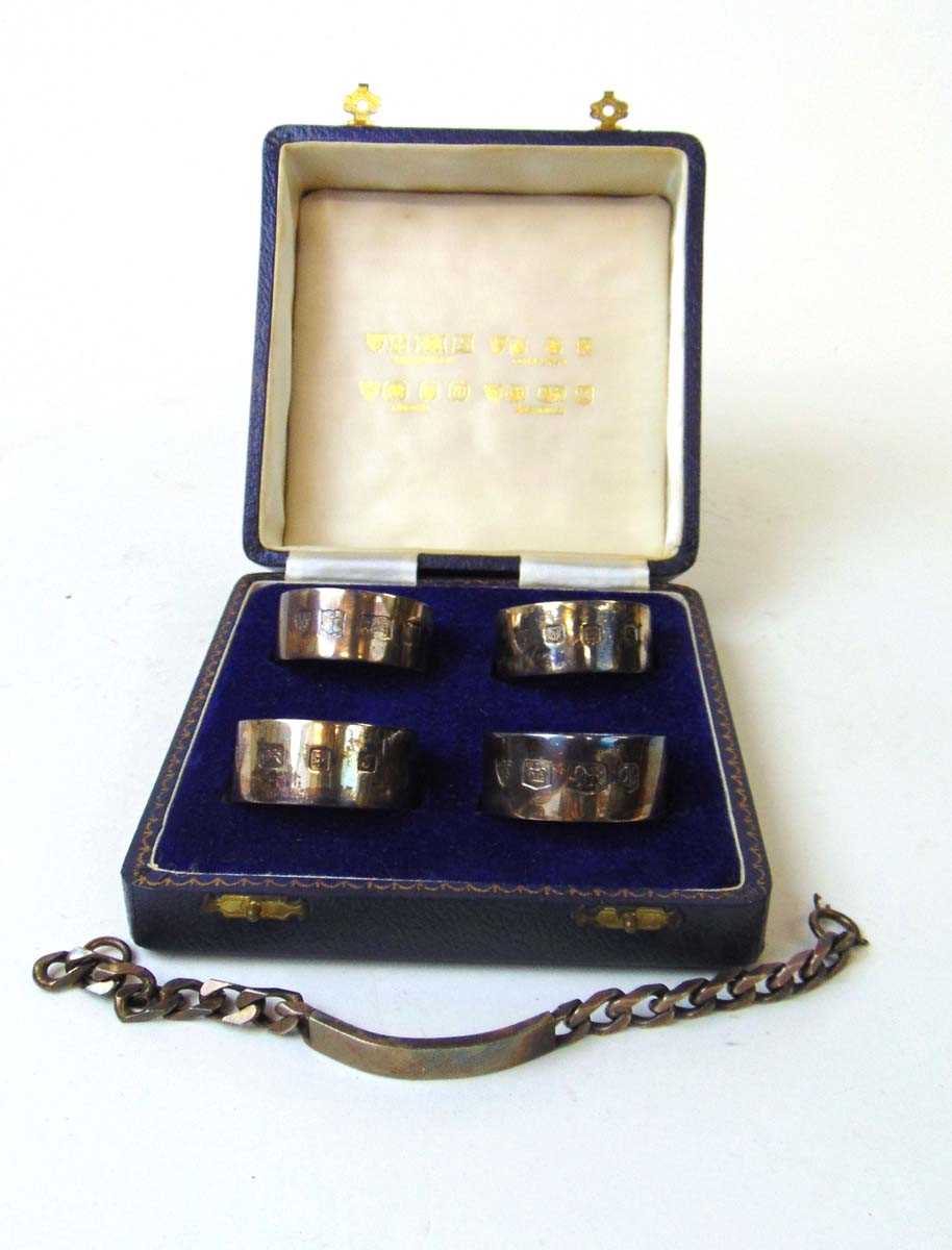 A set of four silver napkin rings, J B Chatterley & Sons, assay marks for Birmingham, Edinburgh,