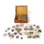 A collection of world coins, 17th to 20th century, to include Elizabeth I silver shillings and groat