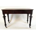 A Victorian mahogany side table, with two short drawers, one stamped Gillows, on gothic style legs