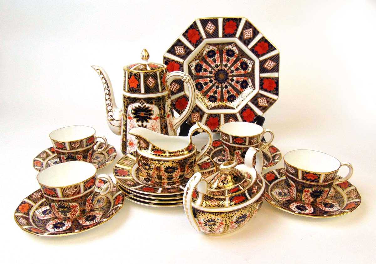 A Royal Crown Derby Imari pattern coffee set for four place settings, pattern 1128, to include