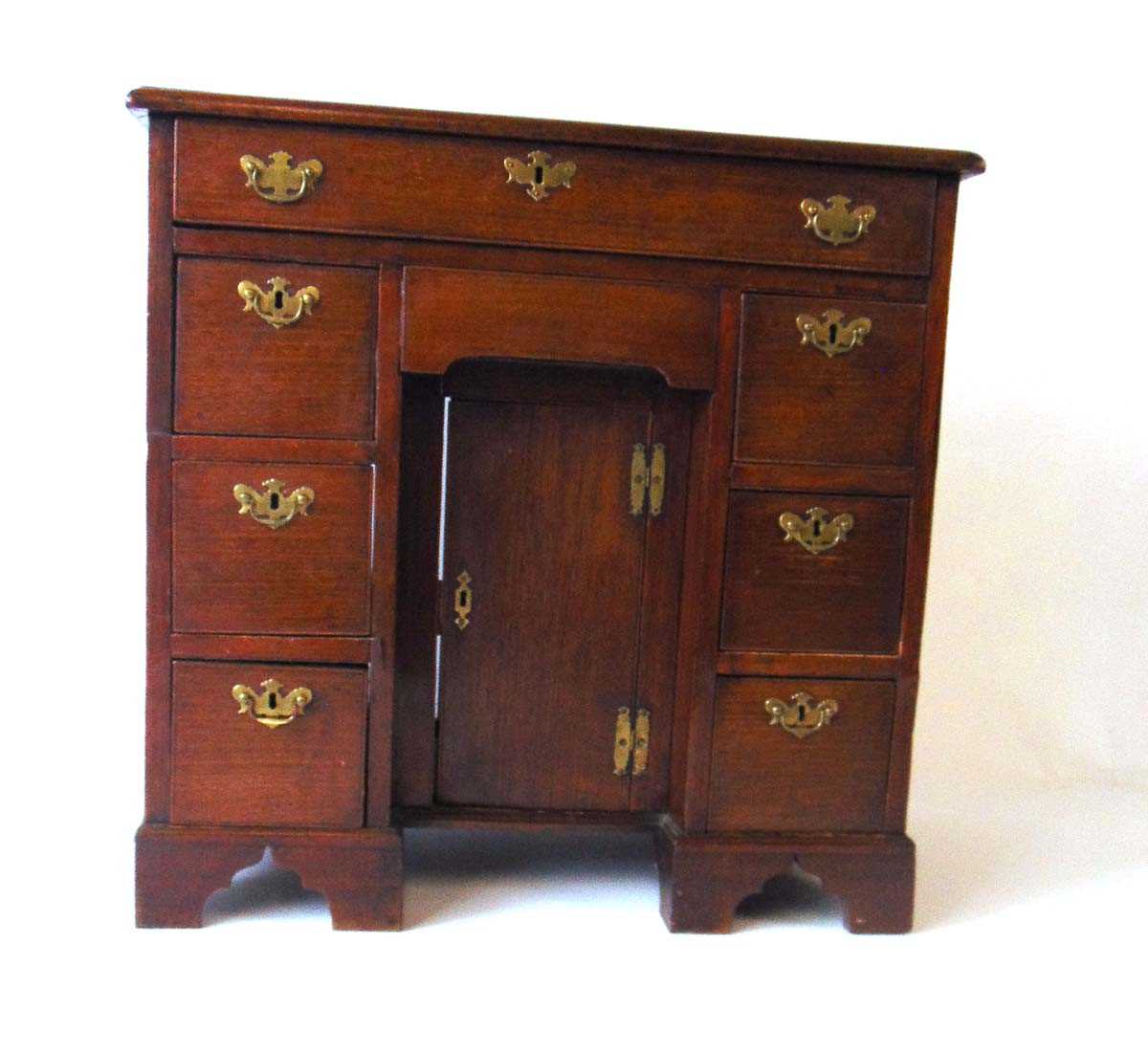 An 18th century mahogany kneehole desk, with applied moulded edge, over an arrangement of one long - Image 4 of 4