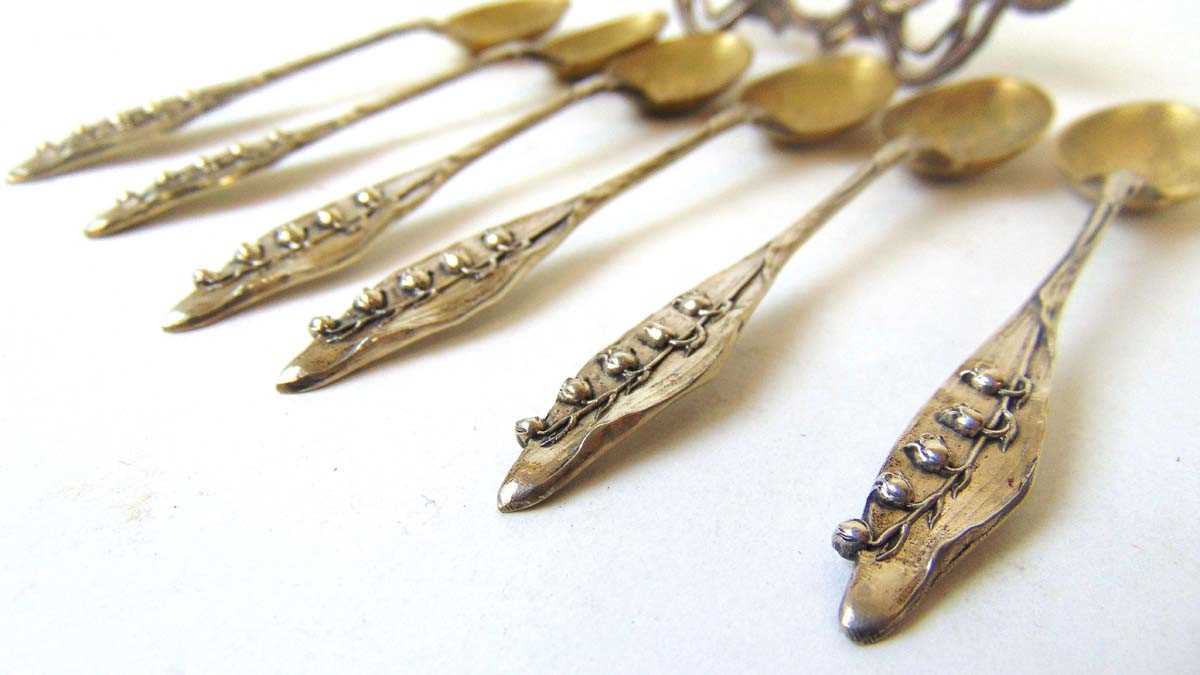 A set of six German silver teaspoons, the gilt bowls decorated with a butterfly, the terminals - Image 3 of 5