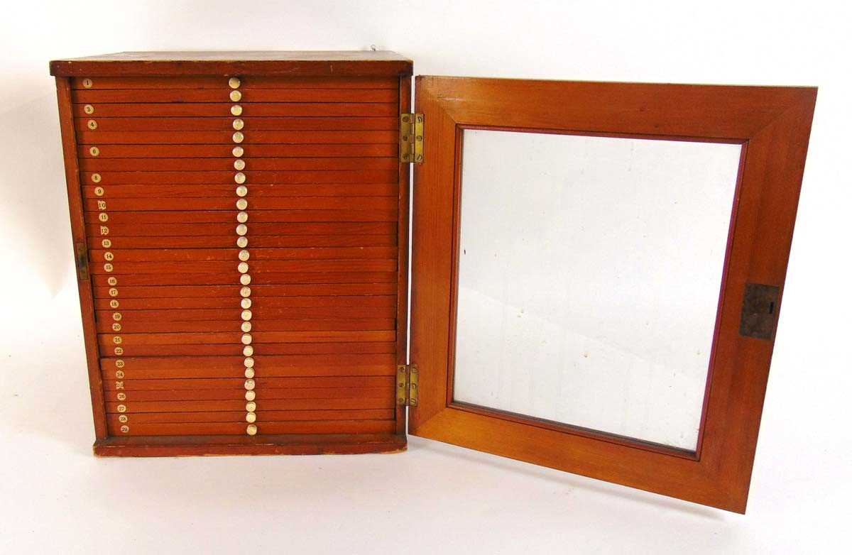 A Victorian collectors cabinet, the stained pine case with glazed door enclosing twenty nine shallow - Image 3 of 10