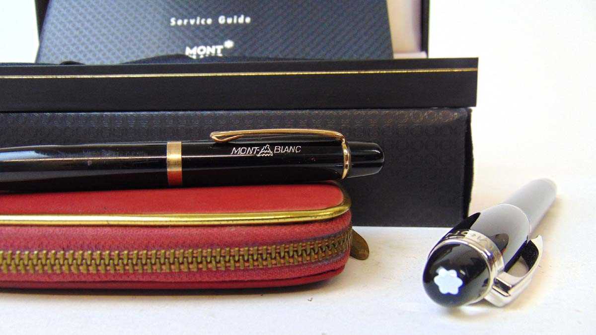 A Mont Blanc Starwalker rollerball pen, with black resin body, with presentation box and service - Image 3 of 4
