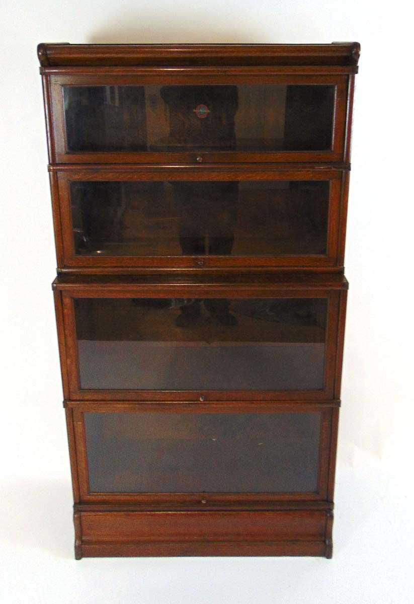 A Globe Wernicke four section oak stepped bookcase, 86.5cm wide, 165cm high