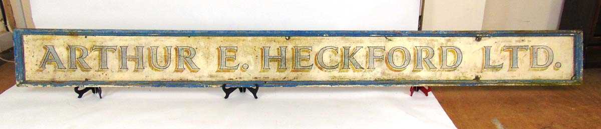 A large painted wood shop sign advertising 'Arthur E Heckford Ltd', 350cm x 35.5cm Graces Guide - Image 4 of 4