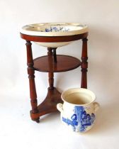 A 19th century mahogany wash basin stand, fitted with a Brown Westhead Moore & Co 'Canova' pattern