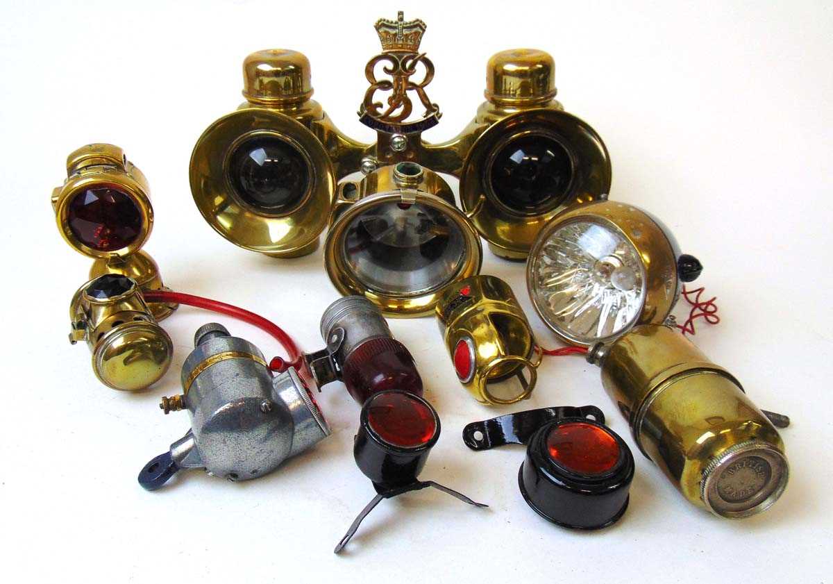 A collection of vintage bicycle lights, mostly brass, to include Miller & Lucas examples, and a pair