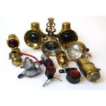A collection of vintage bicycle lights, mostly brass, to include Miller & Lucas examples, and a pair