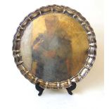 A large silver salver, Martin Hall & Co Ltd, Sheffield 1921, with raised edge on three scroll