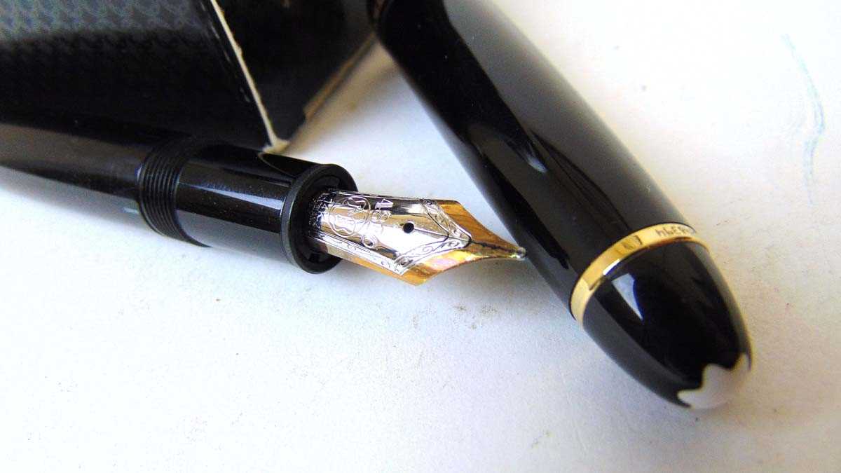 A Montblanc Meisterstuck fountain pen, with black polished resin body and gilt mounts, the 14k nib - Image 3 of 3