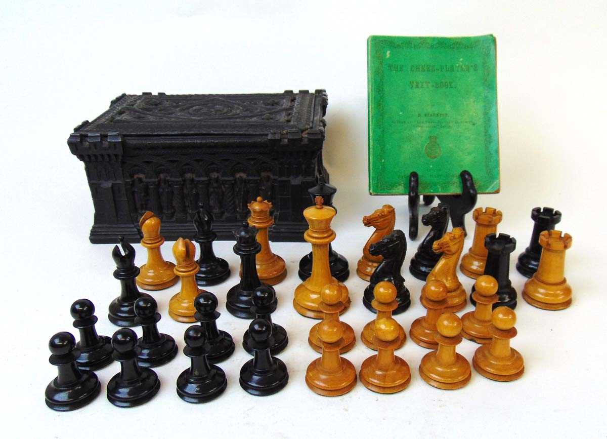 Jacques, London: 'The Staunton Chess Men' boxwood and ebony chess set, mid-19th century, within a