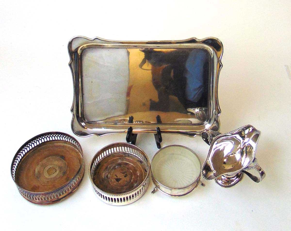 A silver dressing table tray, J & R Griffin, Chester, 1924, 30.5cm x 21cm; a silver butter dish with