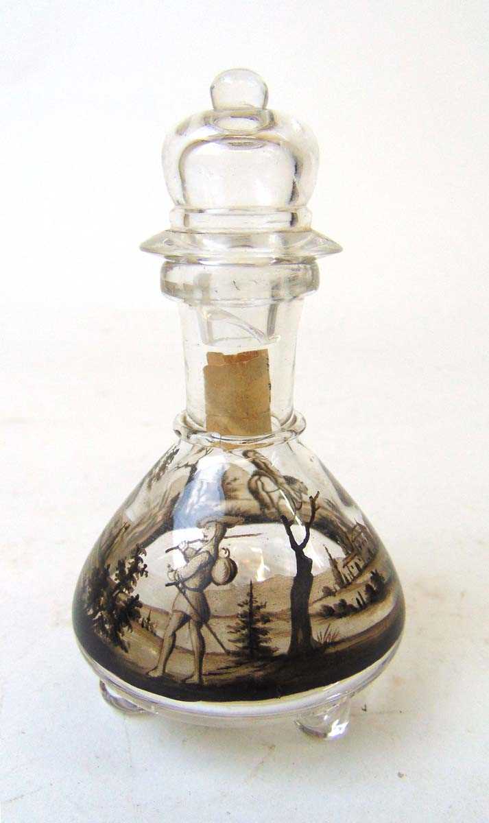 A Lobmeyr glass scent bottle and stopper, schwartzlot decorated with a soldier on horseback and a