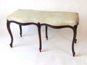 A Victorian mahogany duet stool, with watered silk upholstered seat with horsehair filling, above