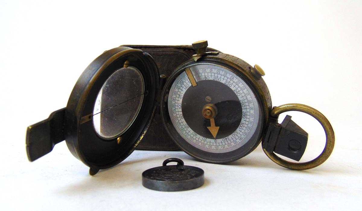 A first world war brass cased military compass by Cruchon & Emons, London, struck 1916, with