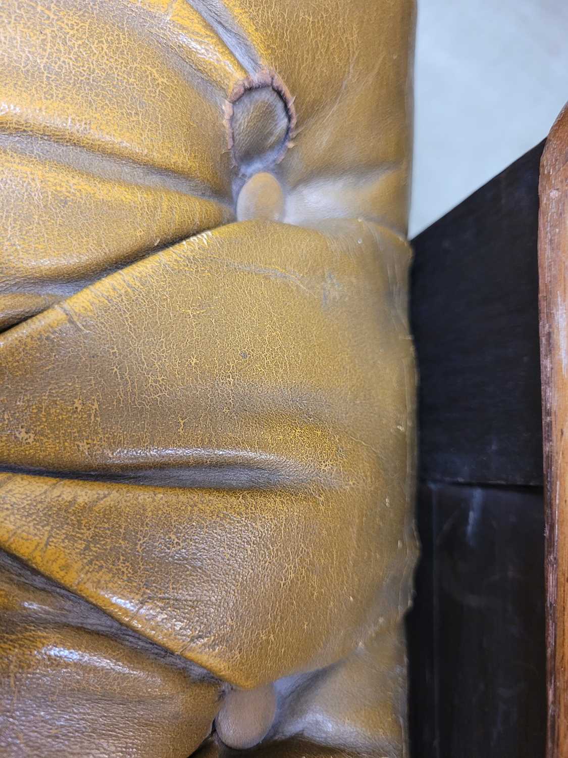 A Victorian green leather upholstered Chesterfield settee, with horsehair and sprung interior, on - Image 4 of 11
