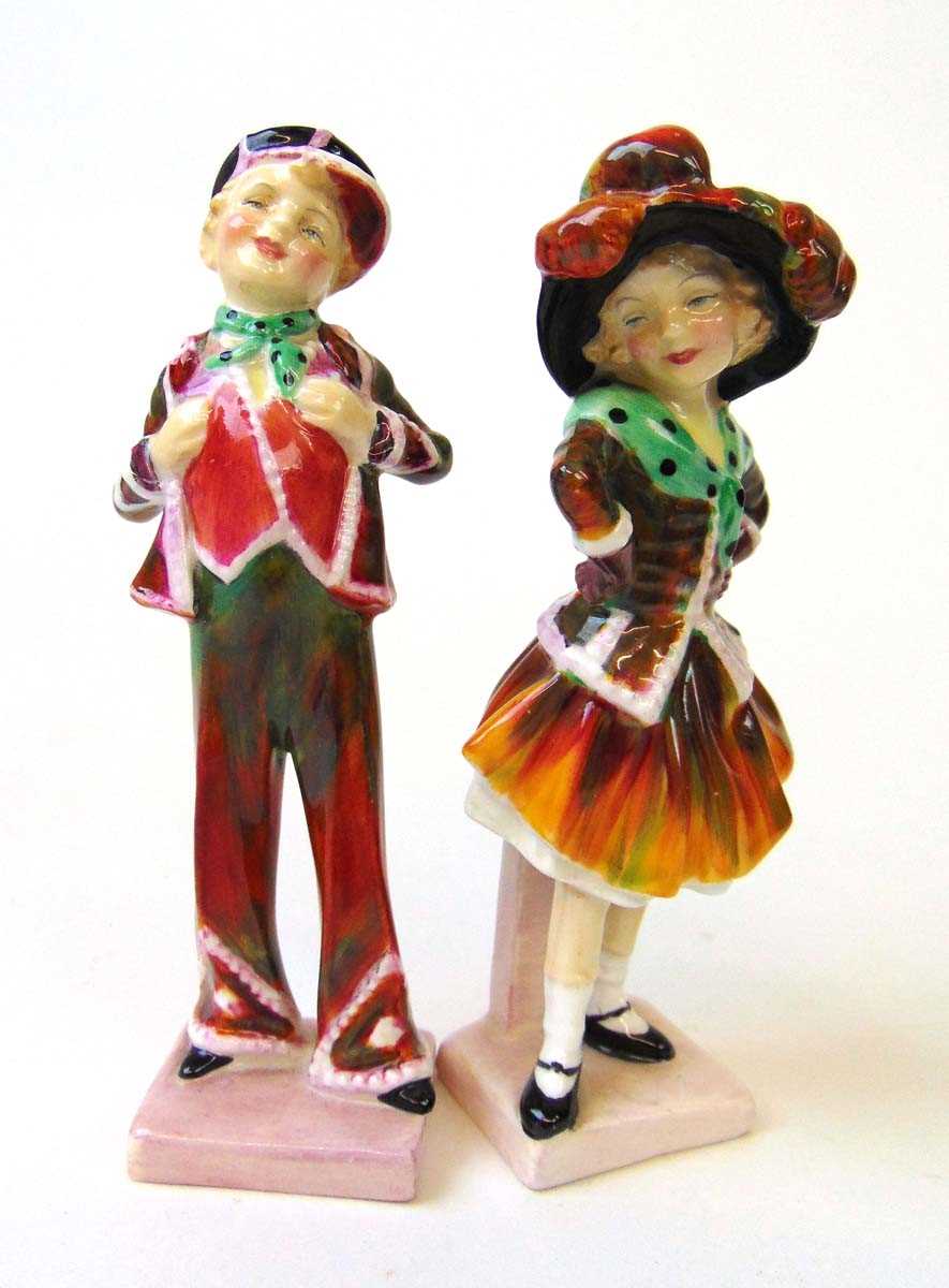 A pair of Royal Doulton figures 'Pearly Boy' & Pearly Girl', HN2035 & HN2036 respectively, 14cm