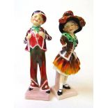 A pair of Royal Doulton figures 'Pearly Boy' & Pearly Girl', HN2035 & HN2036 respectively, 14cm
