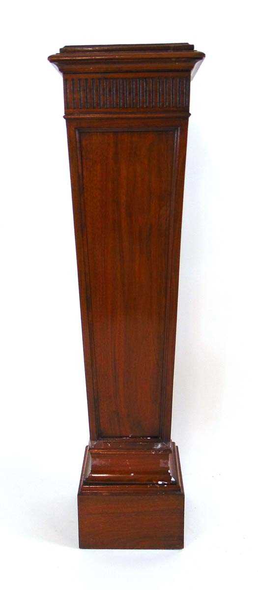 An Edwardian mahogany pedestal, the top with inset red leather panel, above a square tapering body