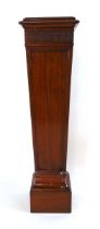 An Edwardian mahogany pedestal, the top with inset red leather panel, above a square tapering body