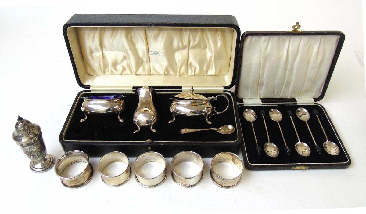 A silver cruet set, Edward Barnard & Sons Ltd, London 1931; a set of six sterling silver coffee bean - Image 2 of 3