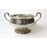 A silver two handled bowl, S Blanckensee & Son Ltd, Chester 1932, of slightly bellied circular form,